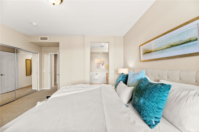 4025 Canario St Unit 142, Carlsbad, CA 92008 - carpeted bedroom featuring baseboards and connected bathroom