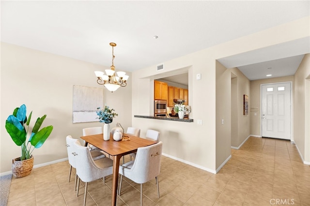 4025 Canario St Unit 142, Carlsbad, CA 92008 - dining room featuring a chandelier and light tile patterned floors