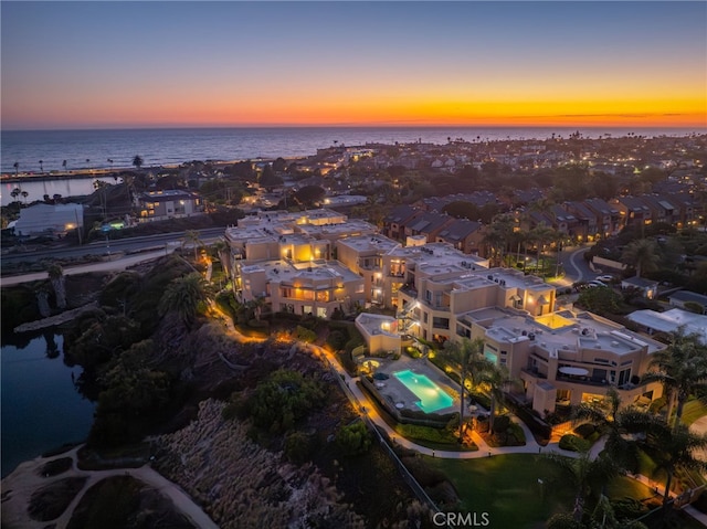 4025 Canario St Unit 142, Carlsbad, CA 92008 - aerial view of property and surrounding area featuring a large body of water and a pool area
