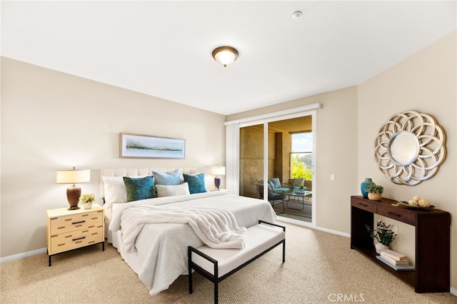 4025 Canario St Unit 142, Carlsbad, CA 92008 - carpeted bedroom featuring access to outside and baseboards