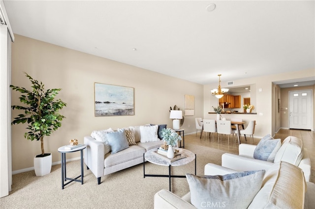 4025 Canario St Unit 142, Carlsbad, CA 92008 - living room with a chandelier and light colored carpet