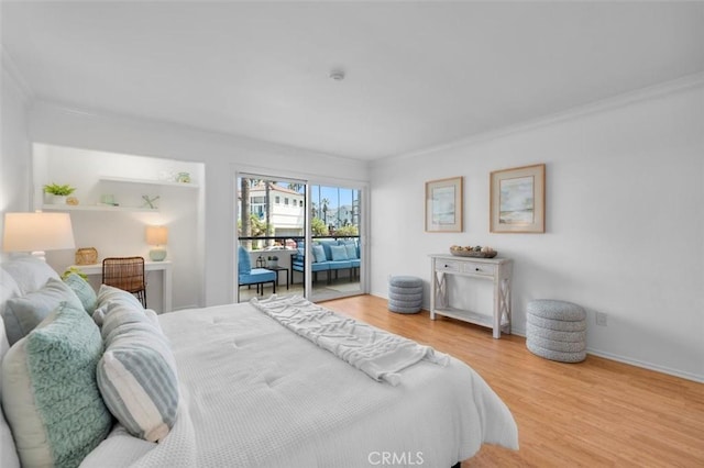 1201 S Catalina Ave Unit 3A, Redondo Beach, CA 90277 - bedroom with ornamental molding, light wood-style flooring, and access to exterior