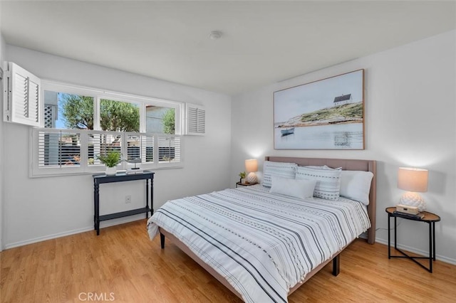 1201 S Catalina Ave Unit 3A, Redondo Beach, CA 90277 - bedroom with light wood-style flooring and baseboards