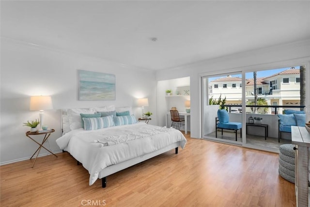 1201 S Catalina Ave Unit 3A, Redondo Beach, CA 90277 - bedroom featuring wood finished floors and access to exterior