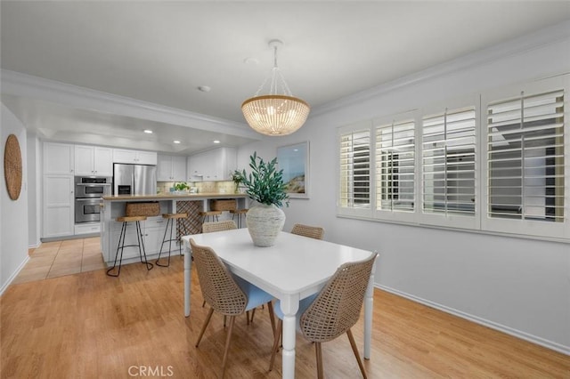 1201 S Catalina Ave Unit 3A, Redondo Beach, CA 90277 - dining room with a chandelier, crown molding, light wood-style floors, and recessed lighting