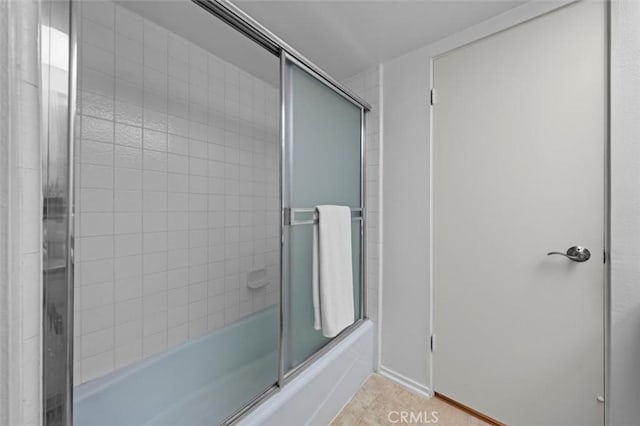 1201 S Catalina Ave Unit 3A, Redondo Beach, CA 90277 - bathroom featuring combined bath / shower with glass door and tile patterned floors