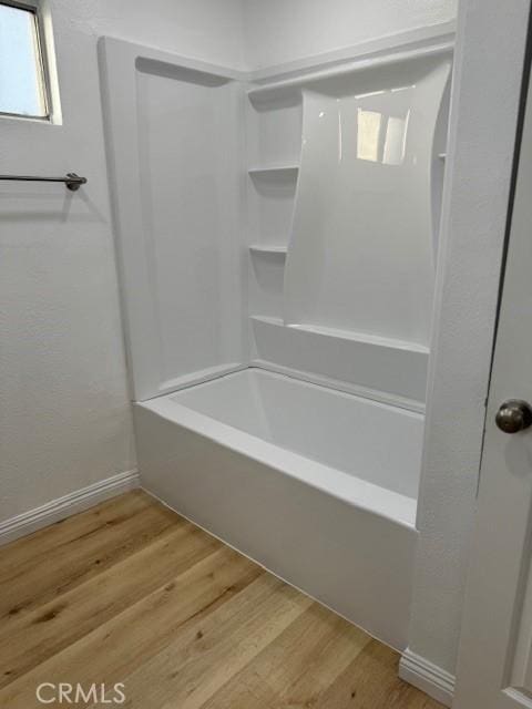 1025 N Tippecanoe Ave Unit 132, San Bernardino, CA 92410 - full bath with wood finished floors and bathing tub / shower combination
