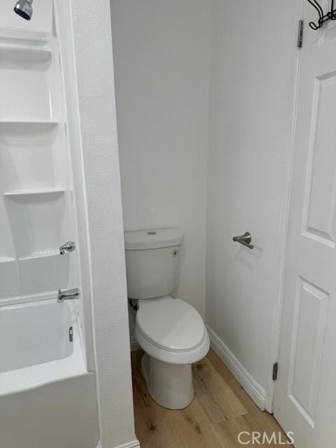 1025 N Tippecanoe Ave Unit 132, San Bernardino, CA 92410 - full bathroom with wood finished floors and shower / bathtub combination