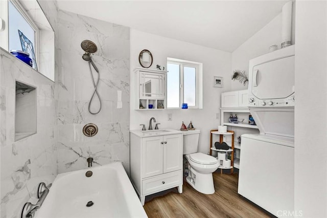 1402 E Rose Ave, Orange, CA 92867 - bathroom featuring stacked washer / dryer, vanity, tub / shower combination, and wood finished floors