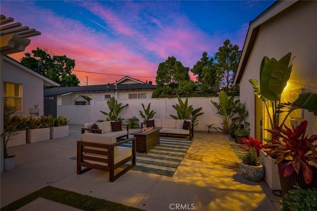 1402 E Rose Ave, Orange, CA 92867 - patio terrace at dusk featuring outdoor lounge area, a patio, and a fenced backyard