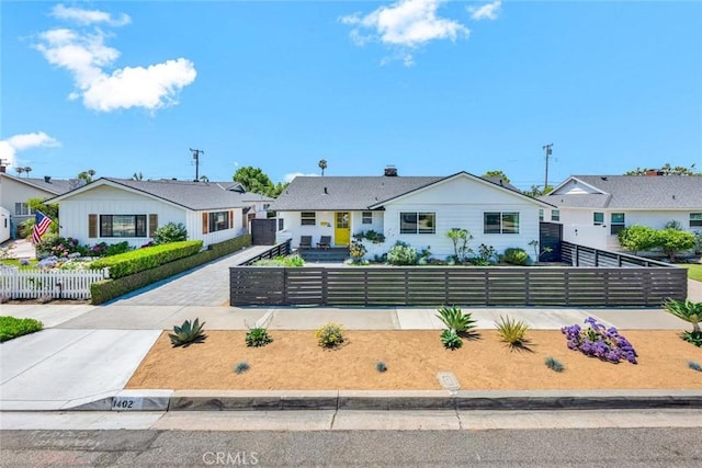 1402 E Rose Ave, Orange, CA 92867 - view of front of home with a fenced front yard and a residential view