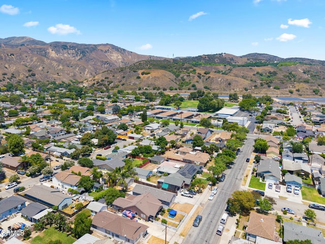 341 1st St, Fillmore, CA 93015 - aerial view of property's location with a mountain backdrop and nearby suburban area