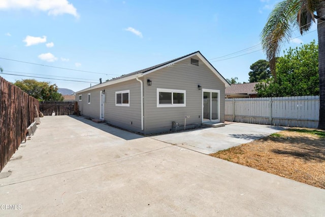 341 1st St, Fillmore, CA 93015 - back of property featuring a patio and a fenced backyard