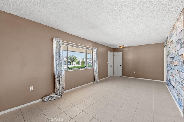 25869 Sandy Lodge Rd, Menifee, CA 92586 - unfurnished room with a textured ceiling and light tile patterned floors