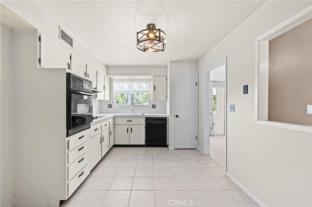 25869 Sandy Lodge Rd, Menifee, CA 92586 - kitchen featuring black appliances, light tile patterned floors, white cabinetry, light countertops, and a chandelier