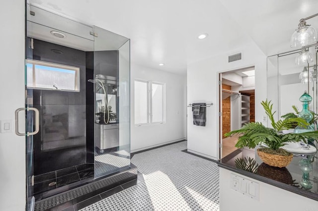 1716 Ocean Front, Del Mar, CA 92014 - full bath featuring plenty of natural light, a shower stall, a spacious closet, tile patterned flooring, and recessed lighting