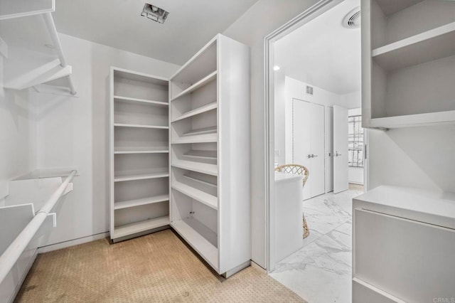 1716 Ocean Front, Del Mar, CA 92014 - walk in closet featuring light marble finish flooring