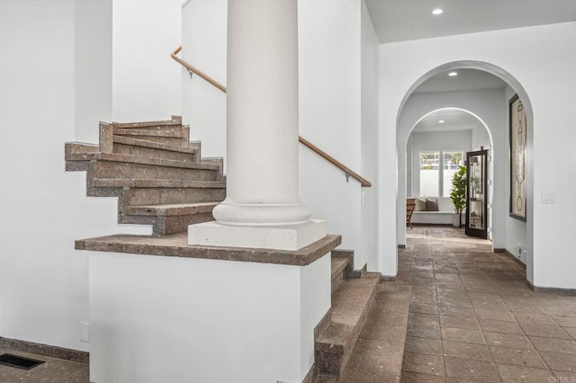 1716 Ocean Front, Del Mar, CA 92014 - staircase featuring recessed lighting, arched walkways, and stone finish flooring