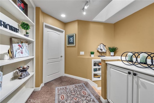 565 N Pageant Dr Unit B, Orange, CA 92869 - foyer featuring light carpet and rail lighting