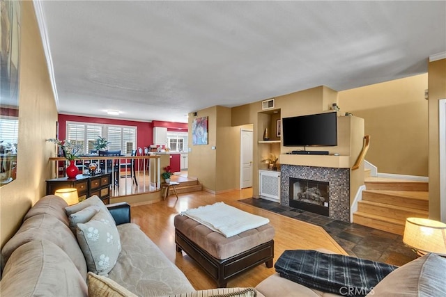 565 N Pageant Dr Unit B, Orange, CA 92869 - living area with baseboards and a fireplace