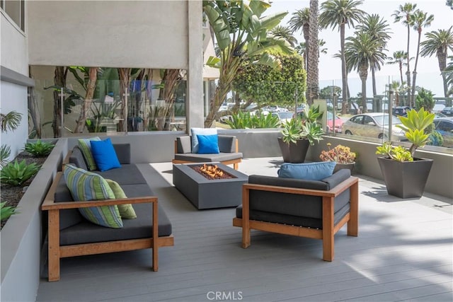 901 Ocean Ave, Santa Monica, CA 90403 - wooden terrace featuring an outdoor living space with a fire pit