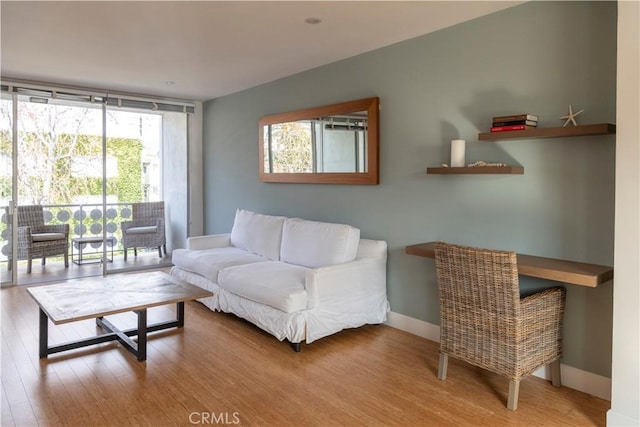 901 Ocean Ave, Santa Monica, CA 90403 - living area with wood finished floors and baseboards