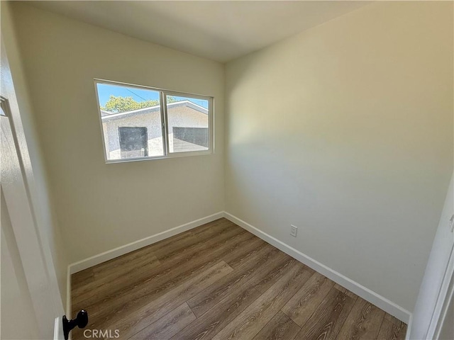 236 S 5th St, Montebello, CA 90640 - empty room with dark wood finished floors and baseboards