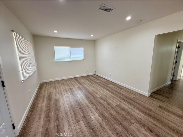236 S 5th St, Montebello, CA 90640 - unfurnished room featuring wood finished floors, recessed lighting, and a smoke detector