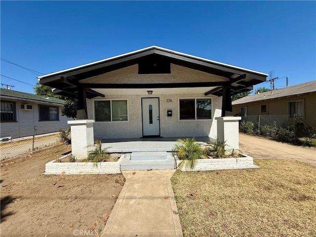 236 S 5th St, Montebello, CA 90640 - view of front of property featuring a porch and stucco siding