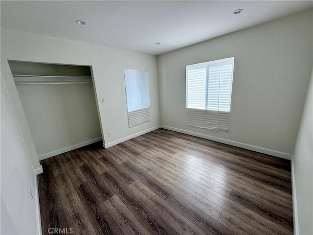 236 S 5th St, Montebello, CA 90640 - unfurnished bedroom with dark wood finished floors, a closet, and recessed lighting
