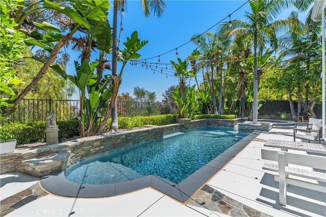 34 Key Largo, Aliso Viejo, CA 92656 - view of swimming pool featuring a pool with connected hot tub, a fenced backyard, and a patio
