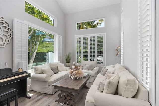 34 Key Largo, Aliso Viejo, CA 92656 - living room featuring high vaulted ceiling and wood finished floors