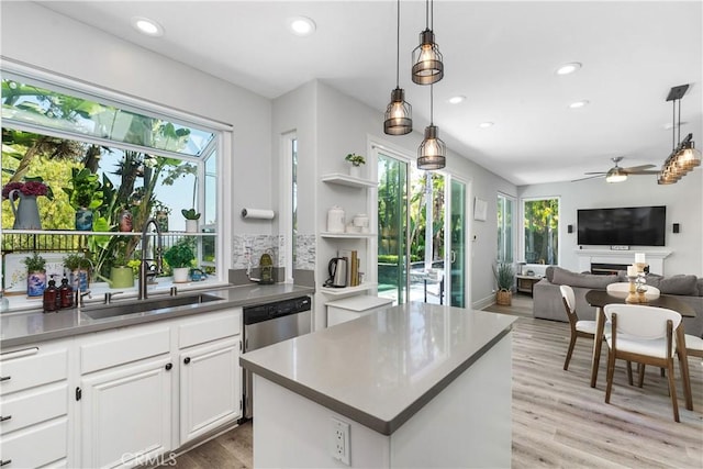 34 Key Largo, Aliso Viejo, CA 92656 - kitchen featuring recessed lighting, white cabinets, ceiling fan, light wood-style floors, and open floor plan