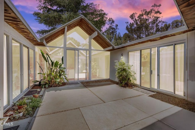 1412 Ellsworth Ct, Thousand Oaks, CA 91360 - exterior entry at dusk with a patio area