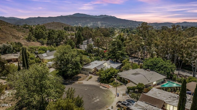 1412 Ellsworth Ct, Thousand Oaks, CA 91360 - aerial view at dusk of a mountain view