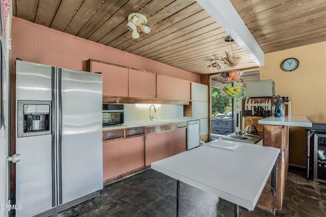 1412 Ellsworth Ct, Thousand Oaks, CA 91360 - kitchen featuring stainless steel appliances, wood ceiling, beverage cooler, and light countertops