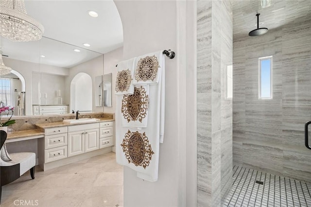 17 Lemans, Newport Coast, CA 92657 - full bath with plenty of natural light, a tile shower, vanity, tile patterned floors, and recessed lighting