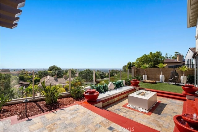 17 Lemans, Newport Coast, CA 92657 - view of patio / terrace featuring a fire pit