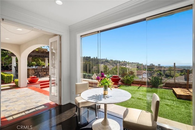 17 Lemans, Newport Coast, CA 92657 - sunroom with crown molding, recessed lighting, arched walkways, and wood finished floors
