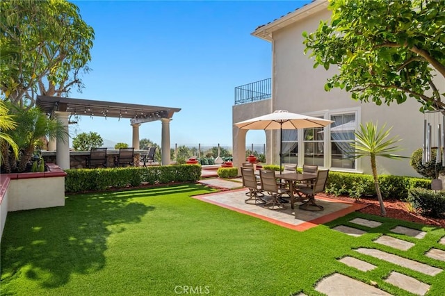 17 Lemans, Newport Coast, CA 92657 - view of green lawn with a pergola, a patio, and a balcony