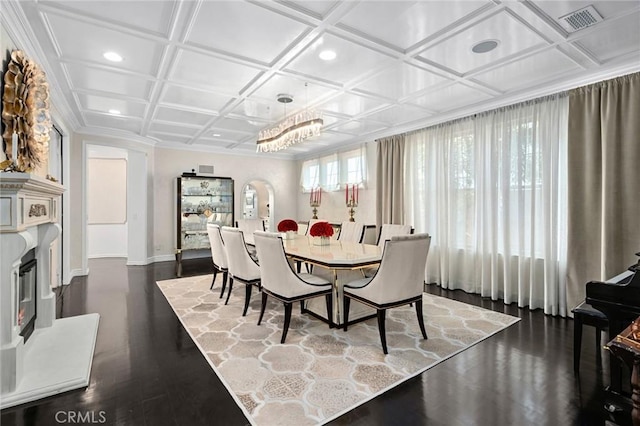 17 Lemans, Newport Coast, CA 92657 - dining area featuring coffered ceiling, recessed lighting, dark wood-type flooring, and crown molding