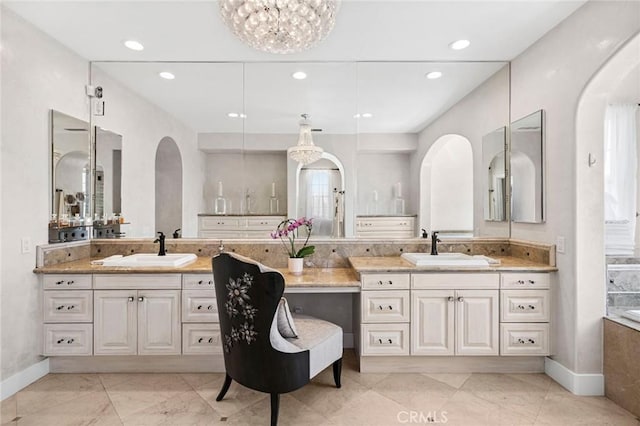 17 Lemans, Newport Coast, CA 92657 - bathroom with vanity, recessed lighting, and a chandelier