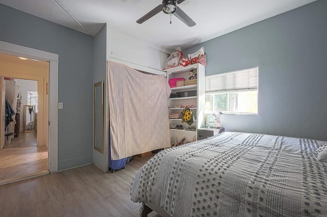320 W 8th Ave, Escondido, CA 92025 - bedroom with wood finished floors, a closet, and a ceiling fan