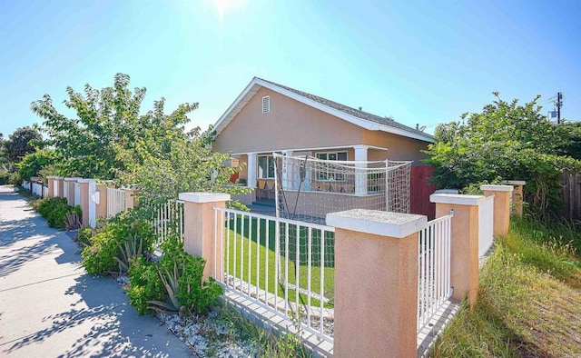 320 W 8th Ave, Escondido, CA 92025 - view of front of house featuring a fenced front yard and stucco siding