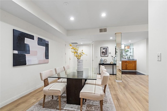 1277 S Beverly Glen Blvd Unit 205, Los Angeles, CA 90024 - dining space featuring light wood-style floors and recessed lighting