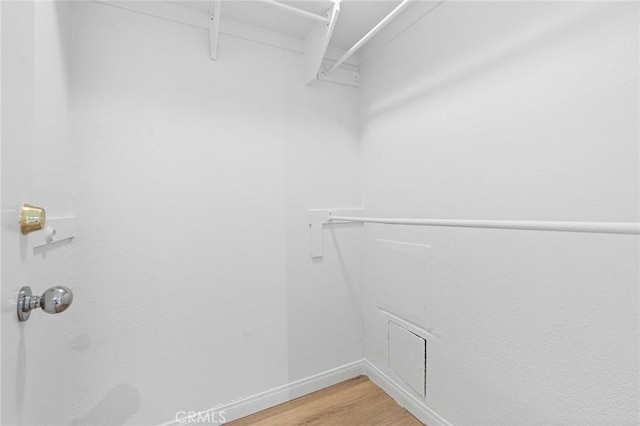1277 S Beverly Glen Blvd Unit 205, Los Angeles, CA 90024 - walk in closet with light wood finished floors