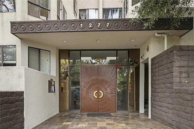 1277 S Beverly Glen Blvd Unit 205, Los Angeles, CA 90024 - view of exterior entry with stucco siding