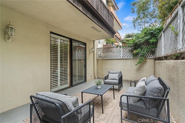 1277 S Beverly Glen Blvd Unit 205, Los Angeles, CA 90024 - view of patio with outdoor lounge area