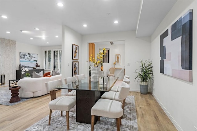 1277 S Beverly Glen Blvd Unit 205, Los Angeles, CA 90024 - dining room featuring light wood-type flooring and recessed lighting