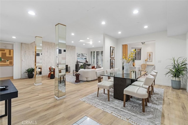 1277 S Beverly Glen Blvd Unit 205, Los Angeles, CA 90024 - dining room featuring light wood-style floors and recessed lighting
